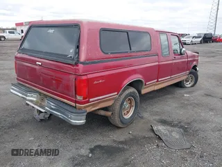 1995 Ford F-150 with VIN 1FTEX14H4SKA04051, listed as a IAAI auction lot 41710957 with 222,312 mi miles. Bid and sale history available at carsss.com. Image 4.