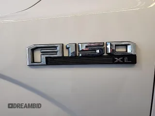 2019 Ford F-150 XL with VIN 1FTEX1E55KKC02870, listed as a IAAI auction lot 41980665 with 206,967 mi miles. Bid and sale history available at carsss.com. Image 1.