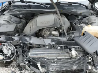 2019 Dodge Challenger R/T z VIN 2C3CDZBT2KH550896, wystawiony jako Copart lot #52299865 z przebiegiem 113 772 mil mil oraz Szkoda całkowita • Salvage title. Historia ofert i sprzedaży dostępna na DreamBid. Obrazek 13.