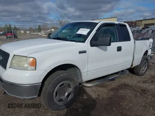 2006 Ford F-150 STX with VIN 1FTRX14W86NB32815, listed as a IAAI auction lot 41909527 with 310,653 mi miles. Bid and sale history available at carsss.com. Image 2.