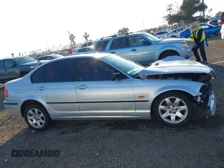 1999 BMW 3 Series 323i with VIN WBAAM3335XFP60154, listed as a IAAI auction lot 41593866 with 189,367 mi miles. Bid and sale history available at carsss.com. Image 14.