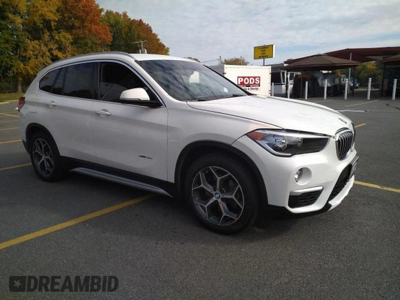 2016 BMW X1 xDrive28i with VIN WBXHT3C3XGP880243, listed as a Copart auction lot 48908425 with 56,100 mi miles and Salvage Title. Bid and sale history available at carsss.com. Image 1.