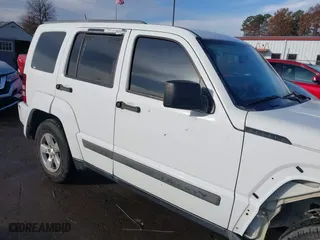 2011 Jeep Liberty Sport with VIN 1J4PP2GK7BW586705, listed as a IAAI auction lot 41110560 with 202,848 mi miles. Bid and sale history available at carsss.com. Image 13.