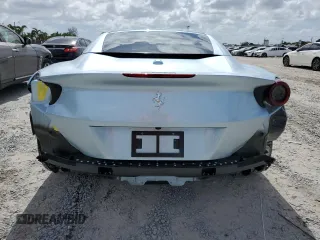 2023 Ferrari Portofino z VIN ZFF02RPA4P0298111, wystawiony jako Copart lot #65799704 z przebiegiem 1096 mil mil oraz Nie do naprawy. Historia ofert i sprzedaży dostępna na DreamBid. Obrazek 6.