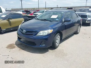 2013 Toyota Corolla L with VIN 5YFBU4EE9DP170801, listed as a IAAI auction lot 42035064 with 138,147 mi miles. Bid and sale history available at carsss.com. Image 2.