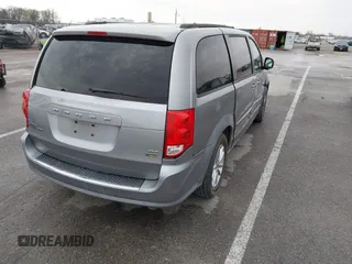 2016 Dodge Grand Caravan SXT with VIN 2C4RDGCG3GR321933, listed as a IAAI auction lot 41895209 with 186,502 mi miles and . Bid and sale history available at DreamBid. Image 4.