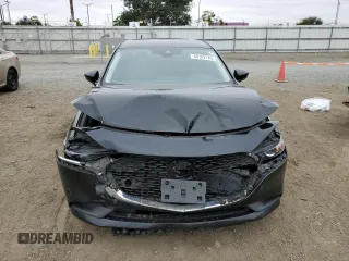 2021 Mazda 3 S z VIN JM1BPAAL8M1323750, wystawiony jako Copart lot #60162145 z przebiegiem 53 235 mil mil oraz Szkoda całkowita • Salvage title. Historia ofert i sprzedaży dostępna na DreamBid. Obrazek 5.