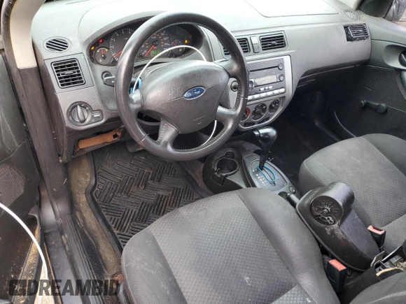 2007 Ford Focus S with VIN 1FAFP31N37W317625, listed as a Copart auction lot 61531315 with 230,530 mi miles and Clean title. Bid and sale history available at DreamBid. Image 8.
