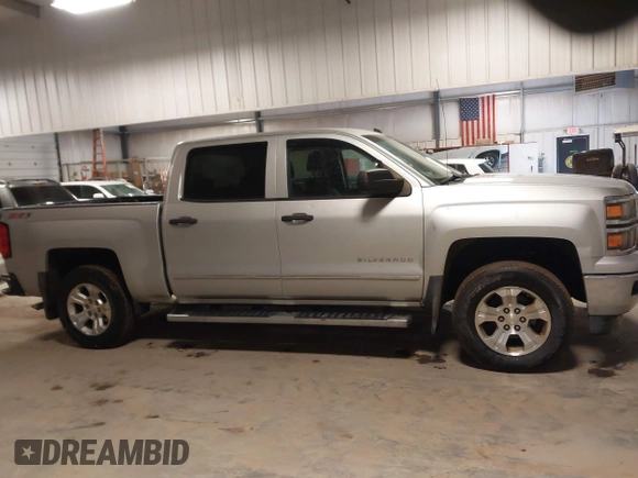 2014 Chevrolet Silverado 1500 LT with VIN 3GCUKREC4EG291351, listed as a IAAI auction lot 41732290 with 194,135 mi miles and . Bid and sale history available at DreamBid. Image 13.