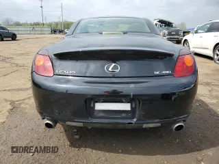 2004 Lexus SC 430 z VIN JTHFN48Y040058272, wystawiony jako Copart lot #55596645 z przebiegiem 179 363 mil mil oraz Tytuł czysty. Historia ofert i sprzedaży dostępna na DreamBid. Obrazek 6.