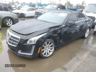 2014 Cadillac CTS Luxury AWD with VIN 1G6AX5SX3E0156938, listed as a IAAI auction lot 41574318 with 151,585 mi miles and . Bid and sale history available at DreamBid. Image 17.