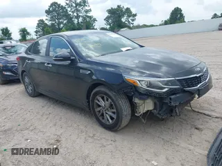 2019 Kia Optima LX z VIN 5XXGT4L37KG308223, wystawiony jako IAAI lot #42158018 z przebiegiem 114 280 mil mil oraz . Historia ofert i sprzedaży dostępna na DreamBid. Obrazek 1.