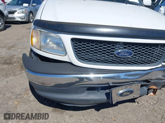 2001 Ford F-150 XL z VIN 1FTRF17W61NB22632, wystawiony jako IAAI lot #41824156 z przebiegiem Nie podano mil oraz . Historia ofert i sprzedaży dostępna na DreamBid. Obrazek 17.