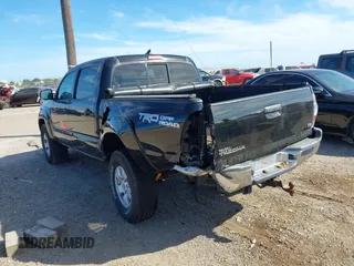 2015 Toyota Tacoma with VIN 3TMLU4EN2FM169326, listed as a IAAI auction lot 40689500 with 77,003 mi miles and . Bid and sale history available at DreamBid. Image 3.