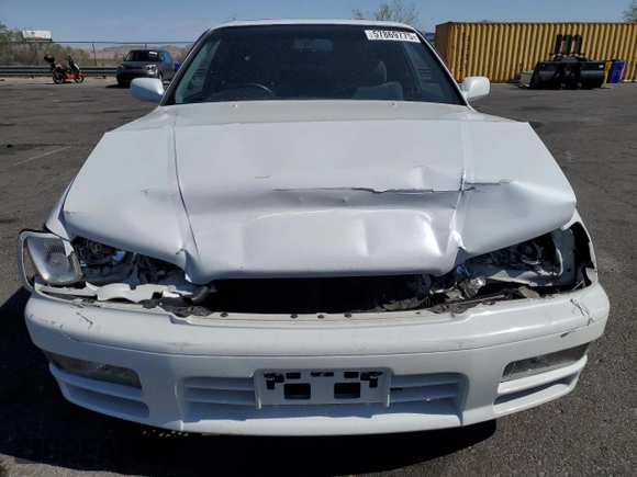 1996 Nissan Cedric z VIN HY33249241, wystawiony jako Copart lot #57869775 z przebiegiem 121 233 mil mil oraz Szkoda całkowita • Salvage title. Historia ofert i sprzedaży dostępna na DreamBid. Obrazek 5.