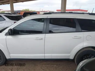 2019 Dodge Journey SE with VIN 3C4PDCBB7KT797842, listed as a IAAI auction lot 42036147 with 163,919 mi miles and . Bid and sale history available at DreamBid. Image 14.