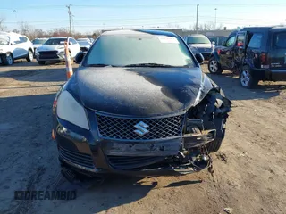 2010 Suzuki Kizashi SE with VIN JS2RE9A34A6100807, listed as a IAAI auction lot 41690974 with 122,419 mi miles and . Bid and sale history available at DreamBid. Image 12.