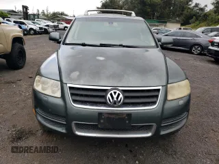 2006 Volkswagen Touareg 4.2L V8 z VIN WVGZM77L16D049631, wystawiony jako Copart lot #84882844 z przebiegiem Nie podano mil oraz Szkoda całkowita • Salvage title. Historia ofert i sprzedaży dostępna na DreamBid. Obrazek 5.