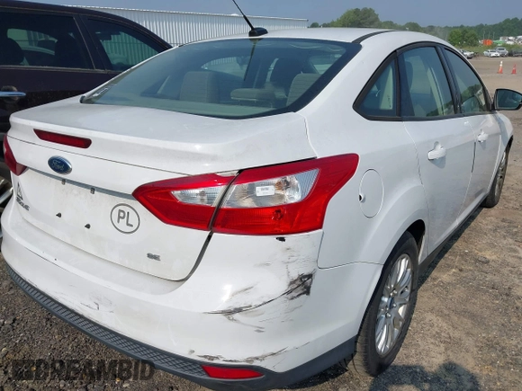 2012 Ford Focus SE with VIN 1FAHP3F21CL192126, listed as a IAAI auction lot 42598631 with 125,741 mi miles and . Bid and sale history available at DreamBid. Image 6.