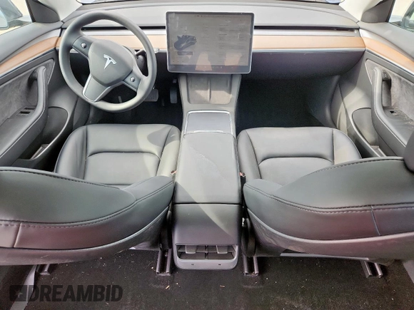 2023 Tesla Model 3 with VIN 5YJ3E1EA1PF468627, listed as a Copart auction lot 57285575 with 5,952 mi miles and Salvage title. Bid and sale history available at DreamBid. Image 8.