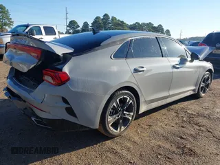 2023 Kia K5 GT-Line z VIN 5XXG64J22PG224836, wystawiony jako IAAI lot #41743997 z przebiegiem 26 633 mil mil oraz . Historia ofert i sprzedaży dostępna na DreamBid. Obrazek 4.