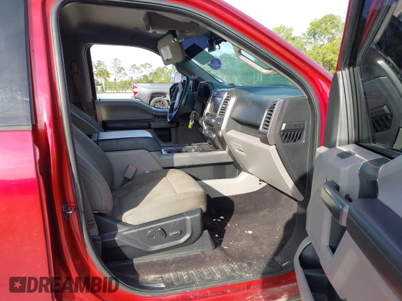 2015 Ford F-150 XLT with VIN 1FTEW1C87FKD70547, listed as a IAAI auction lot 41451841 with 151,596 mi miles and . Bid and sale history available at carsss.com. Image 5.