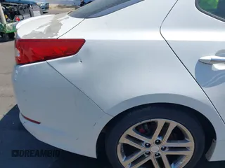 2013 Kia Optima SX with VIN 5XXGR4A64DG239506, listed as a IAAI auction lot 42406234 with 158,626 mi miles and . Bid and sale history available at DreamBid. Image 14.