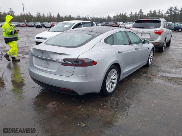 2017 Tesla Model S 100D with VIN 5YJSA1E22HF201241, listed as a IAAI auction lot 41811880 with 72,094 mi miles. Bid and sale history available at carsss.com. Image 4.