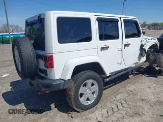 2017 Jeep Wrangler Unlimited Rubicon with VIN 1C4BJWFG9HL695361, listed as a IAAI auction lot 42010655 with 65,536 mi miles and . Bid and sale history available at DreamBid. Image 4.