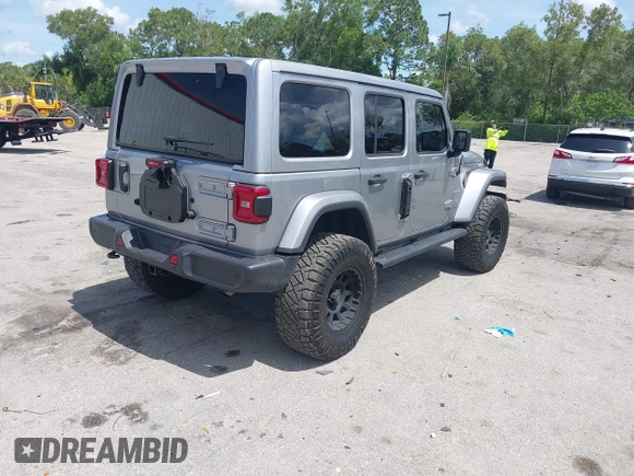 2021 Jeep Wrangler Unlimited Sahara with VIN 1C4HJXEN9MW637288, listed as a IAAI auction lot 42553459 with 39,362 mi miles and . Bid and sale history available at DreamBid. Image 4.
