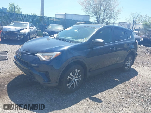 2017 Toyota RAV4 LE with VIN JTMBFREV8HJ168975, listed as a IAAI auction lot 42139354 with 91,394 mi miles and . Bid and sale history available at DreamBid. Image 2.