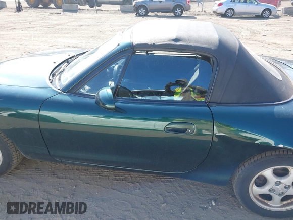1999 Mazda MX-5 Miata with VIN JM1NB3537X0109618, listed as a IAAI auction lot 41795736 with 160,452 mi miles and . Bid and sale history available at DreamBid. Image 15.