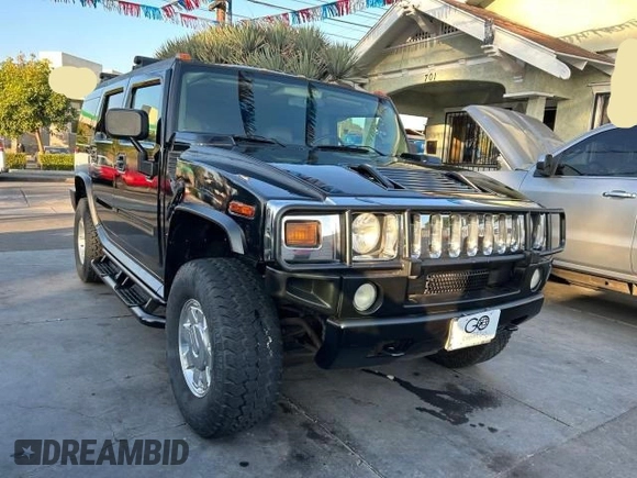 2003 Hummer H2 with VIN 5GRGN23U23H145183, listed as a Copart auction lot 84566884 with 85,945 mi miles and Clean Title. Bid and sale history available at carsss.com. Image 1.