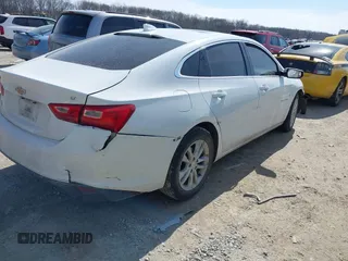 2018 Chevrolet Malibu LT z VIN 1G1ZD5ST6JF238524, wystawiony jako IAAI lot #41701717 z przebiegiem 167 986 mil mil oraz . Historia ofert i sprzedaży dostępna na DreamBid. Obrazek 4.