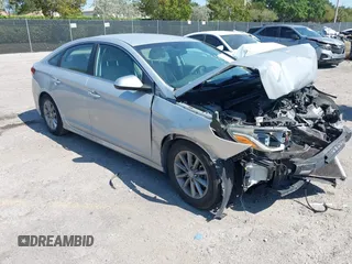 2018 Hyundai Sonata SE z VIN 5NPE24AFXJH667138, wystawiony jako IAAI lot #42043806 z przebiegiem 107 419 mil mil oraz . Historia ofert i sprzedaży dostępna na DreamBid. Obrazek 1.