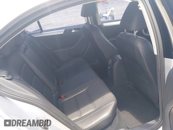 2014 Volkswagen Jetta SE with VIN 3VWD07AJ6EM240396, listed as a IAAI auction lot 42503653 with 146,920 mi miles and . Bid and sale history available at DreamBid. Image 8.