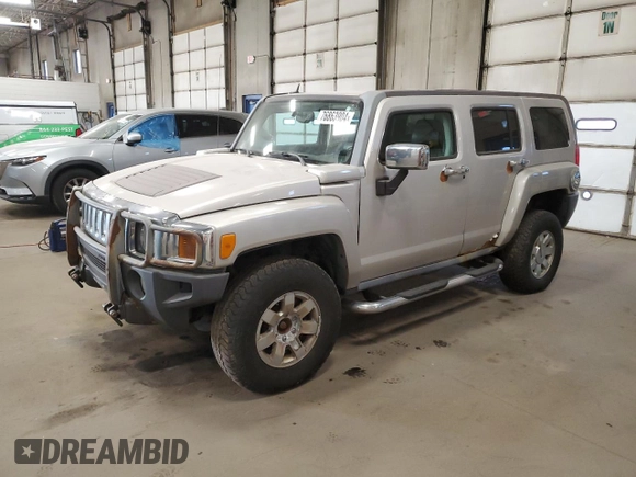 2007 Hummer H3 SUV with VIN 5GTDN13E778137599, listed as a Copart auction lot 76863904 with 210,810 mi miles and Salvage Title. Bid and sale history available at DreamBid. Image 1.