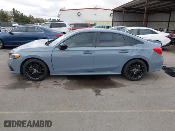 2022 Honda Civic Sport z VIN 2HGFE2F58NH569211, wystawiony jako IAAI lot #41784870 z przebiegiem 22 255 mil mil oraz . Historia ofert i sprzedaży dostępna na DreamBid. Obrazek 14.