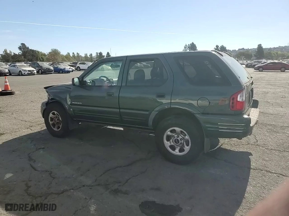 2004 Isuzu Rodeo S with VIN 4S2CK58W344303242, listed as a Copart auction lot 75339714 with 106,659 mi miles and Salvage Title. Bid and sale history available at carsss.com. Image 11.