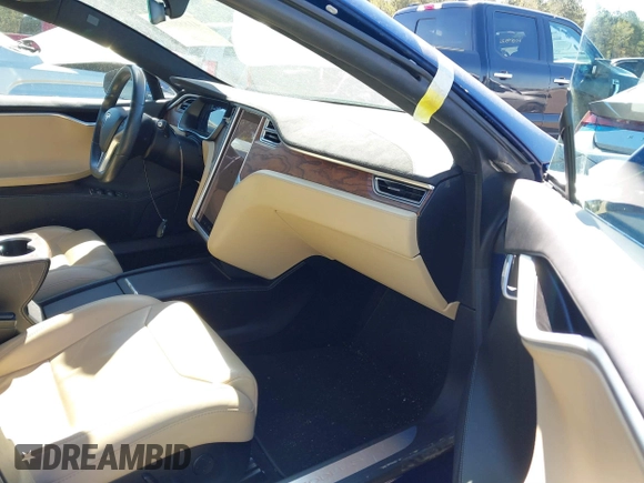 2017 Tesla Model S 60 with VIN 5YJSA1E19HF186227, listed as a IAAI auction lot 41888015 with 105,510 mi miles and . Bid and sale history available at DreamBid. Image 5.