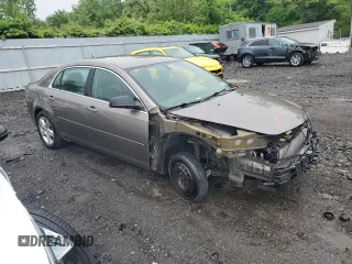 2011 Chevrolet Malibu 1LS with VIN 1G1ZB5E10BF200563, listed as a Copart auction lot 56359625 with 130,820 mi miles and Salvage Title. Bid and sale history available at DreamBid. Image 4.
