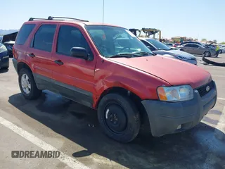 2003 Ford Escape XLT Popular 2 with VIN 1FMYU93123KB02310, listed as a IAAI auction lot 41975073 with 169,864 mi miles. Bid and sale history available at carsss.com. Image 6.