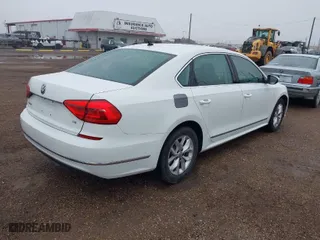 2016 Volkswagen Passat 1.8T S with VIN 1VWAS7A39GC023377, listed as a IAAI auction lot 41422834 with 92,872 mi miles. Bid and sale history available at carsss.com. Image 4.