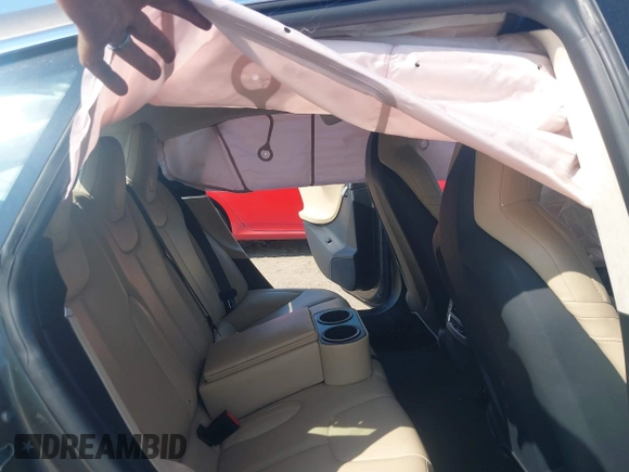 2016 Tesla Model S 70 with VIN 5YJSA1E1XGF126620, listed as a IAAI auction lot 40227035 with 71,400 mi miles and . Bid and sale history available at DreamBid. Image 8.