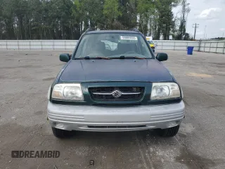 1999 Suzuki Grand Vitara JLX z VIN JS3TD62V0X4124366, wystawiony jako Copart lot #50885055 z przebiegiem 204 168 mil mil oraz Szkoda całkowita • Salvage title. Historia ofert i sprzedaży dostępna na DreamBid. Obrazek 5.
