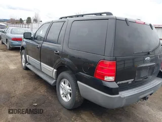 2005 Ford Expedition Special Service with VIN 1FMPU16515LA34140, listed as a IAAI auction lot 41836095 with 214,365 mi miles. Bid and sale history available at carsss.com. Image 3.