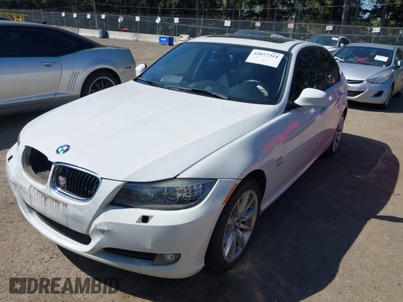 2011 BMW 3 Series 328i xDrive with VIN WBAPK5C54BA660470, listed as a IAAI auction lot 42077314 with 69,572 mi miles and . Bid and sale history available at DreamBid. Image 2.