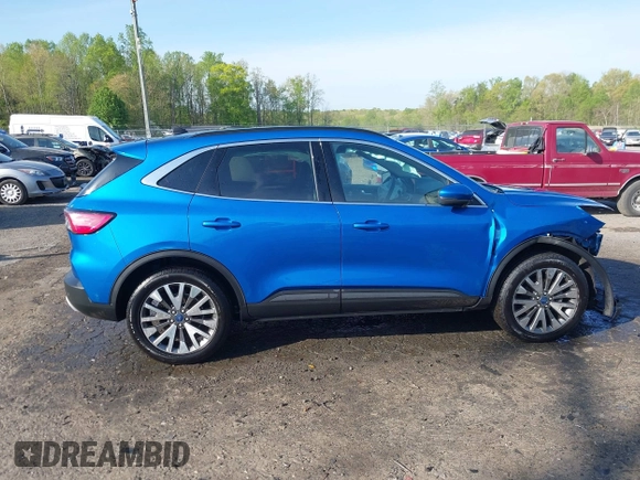 2020 Ford Escape Titanium Hybrid with VIN 1FMCU9DZ1LUB59214, listed as a IAAI auction lot 42050336 with 59,547 mi miles and . Bid and sale history available at DreamBid. Image 13.