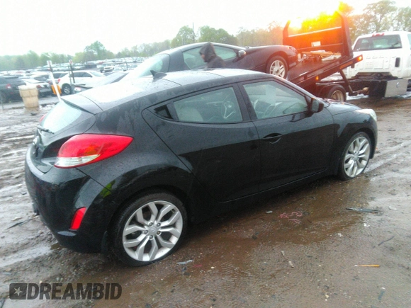 2012 Hyundai Veloster w/Gray Int with VIN KMHTC6AD2CU024382, listed as a IAAI auction lot 41980192 with 46,684 mi miles and . Bid and sale history available at DreamBid. Image 4.