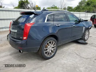 2014 Cadillac SRX Performance Collection с VIN 3GYFNCE34ES580069, выставлен на аукционе Copart как лот 60662415 с пробегом 141 107 миль миль и Списание • Salvage title. История ставок и продаж доступна на DreamBid. Изображение 3.